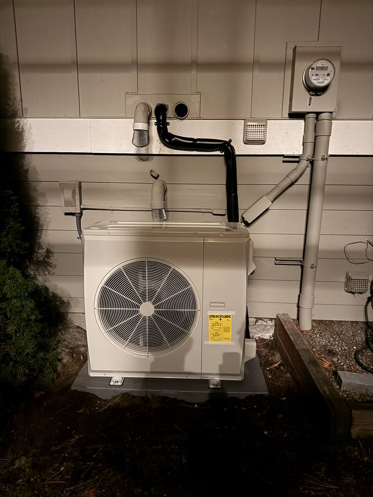 Ductless heat pump outdoor unit installed on a Bellevue home