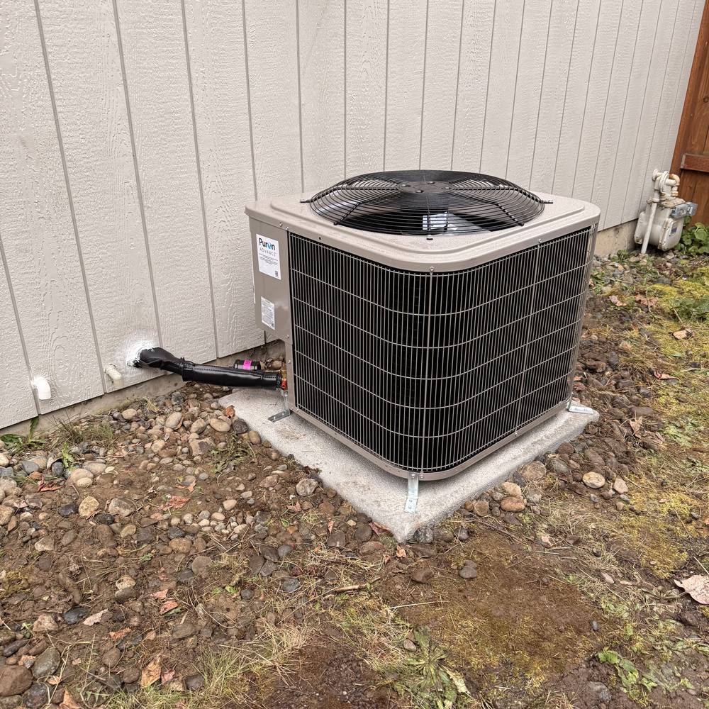 Bryant heat pump outdoor unit on a new pad in Kent
