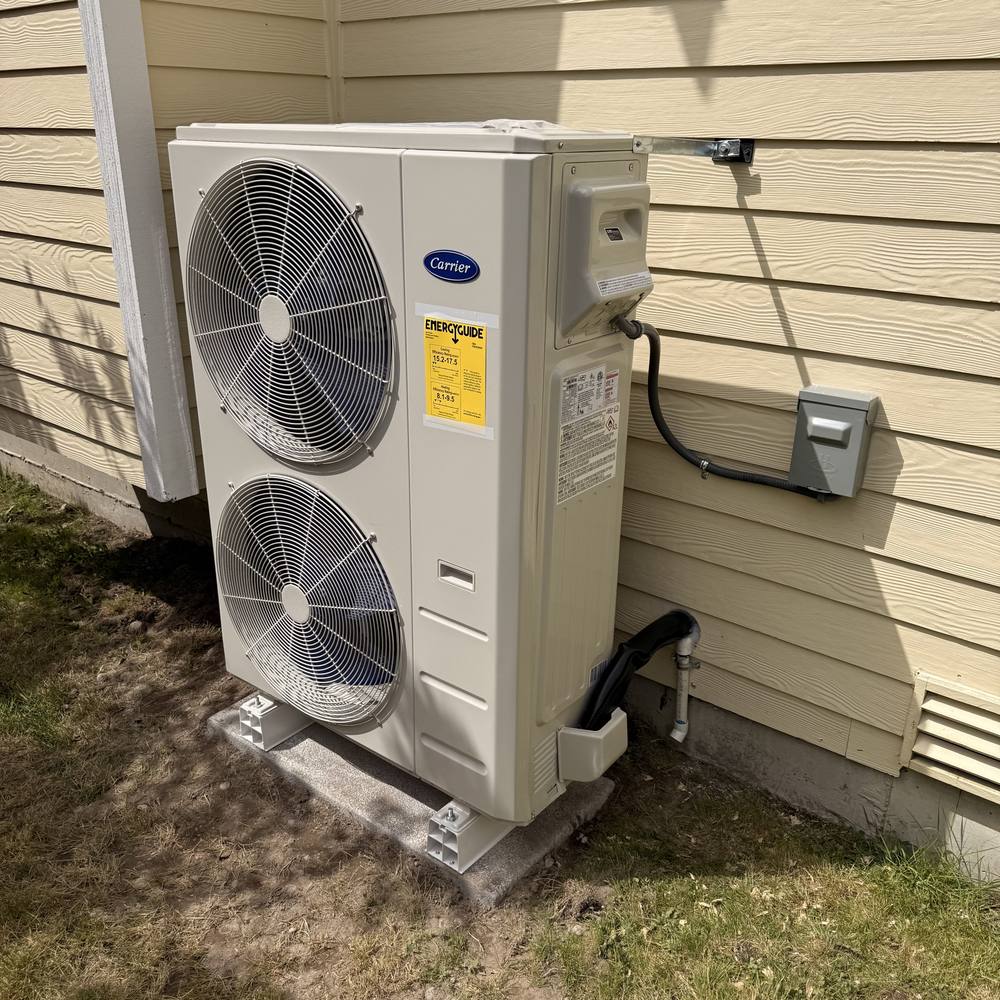 Carrier heat pump outdoor unit installed in Renton