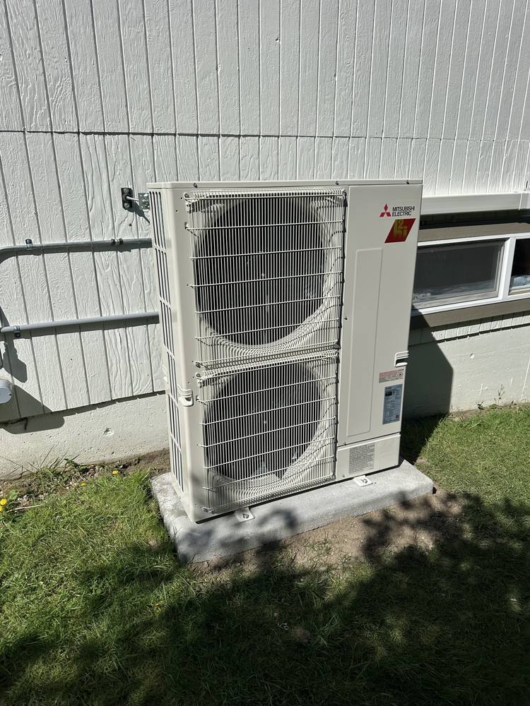 Mitsubishi Electric heat pump outdoor unit installed in Seattle
